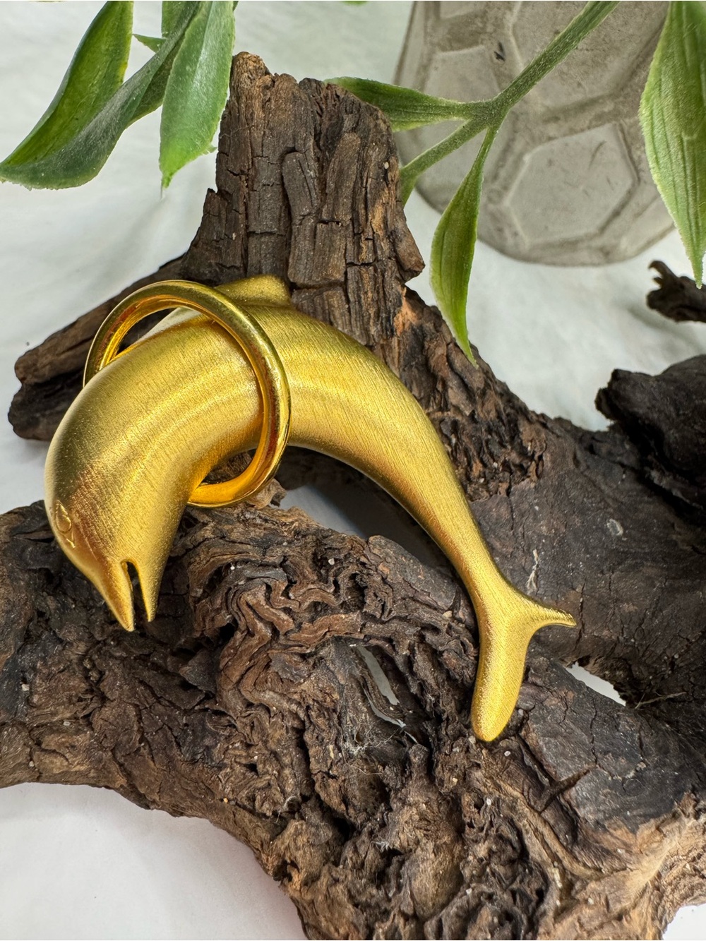 Vintage dolphin brooch, EUC. Satin gold tone finish, jumping thru polished hoop.